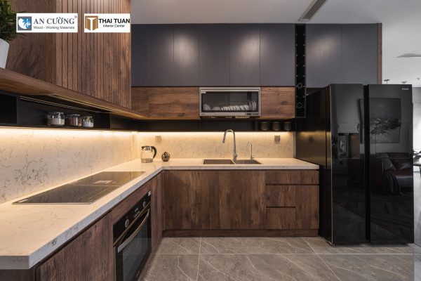Căn bếp sử dụng MFC MS 442 RL, cùng điểm nhấn màu beton MFC MS 431 BT trong toàn bộ căn hộ
